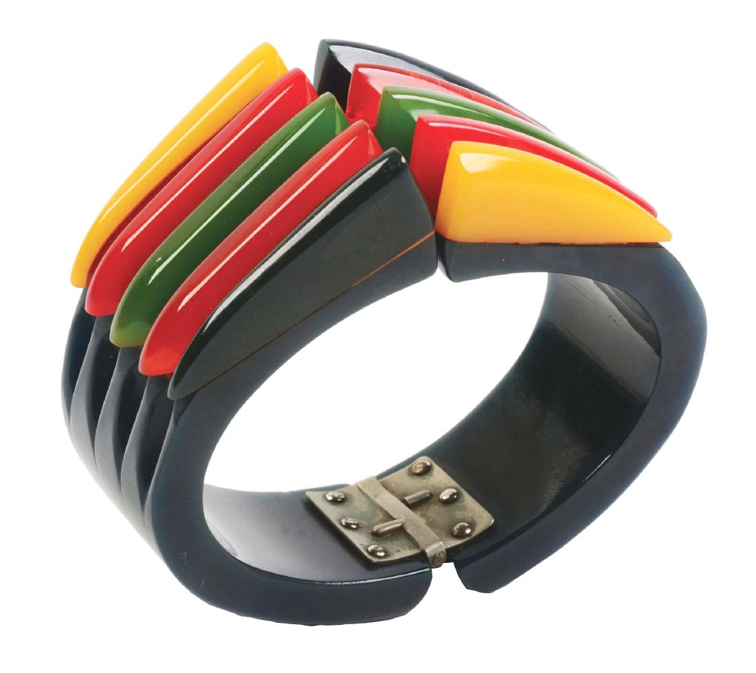 Bakelite Bracelet.: Extremely rare and desirable Philadelphia bracelet. One side of bracelet with replaced panel of colors. Condition: (Excellent). Dimensions: 3" x 2 - 1/4" Dia.