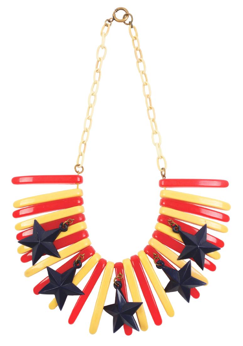 Patriotic Bakelite Necklace.: Beautiful patriotc carved necklace. Great color and design. Condition: (Excellent). Dimensions: 6" x 2".