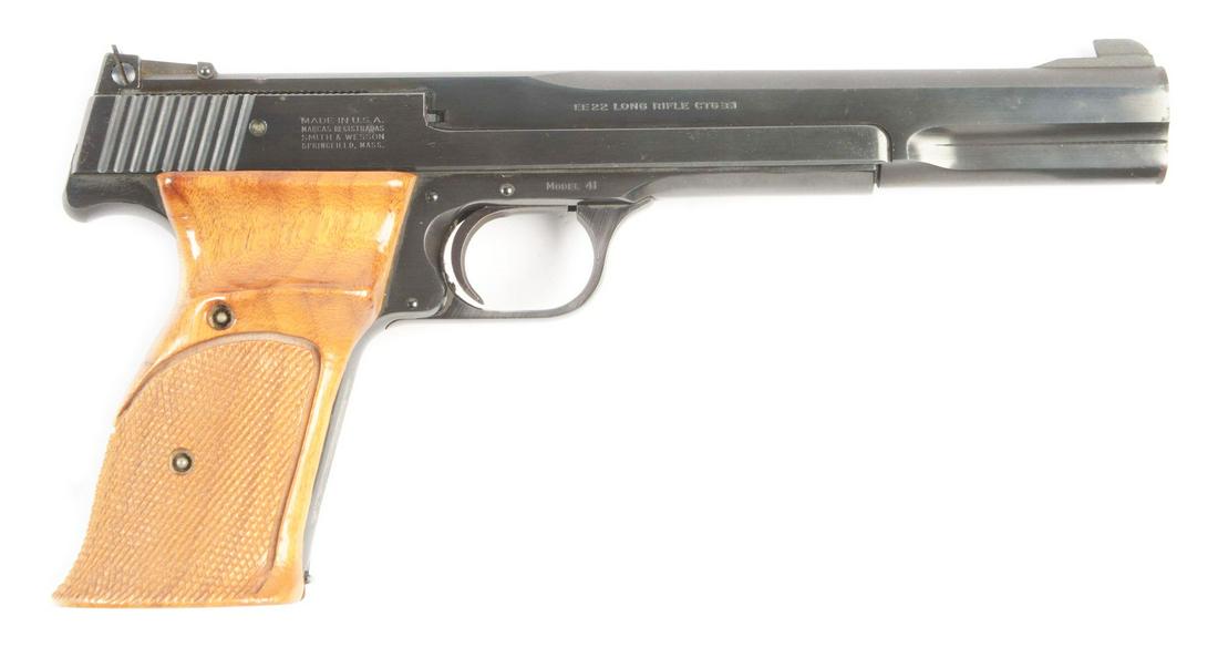 (M) SMITH & WESSON MODEL 41 SEMI-AUTOMATIC .22 TARGET: Made in 1984, this is a standard blued 7" Smith & Wesson target pistol. CONDITION: This example has a minor handling mark or two but you will have to search to find one. Near new inside and out with m