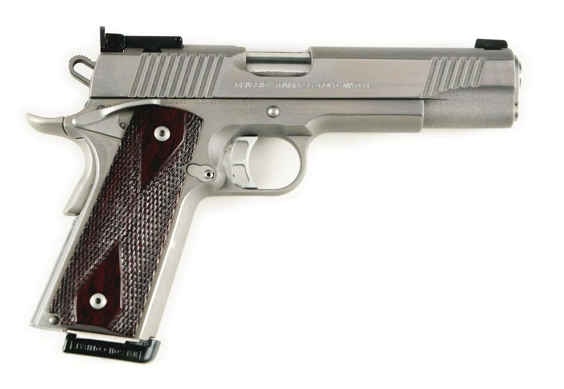 (M) KIMBER 1911 CLASSIC STAINLESS GOLD MATCH: Manufactured around 2000 given included advertisement. Has the following features: adjustable rear sight, blacked out wind adjustable front, front and rear cocking serrations, commander style lightene