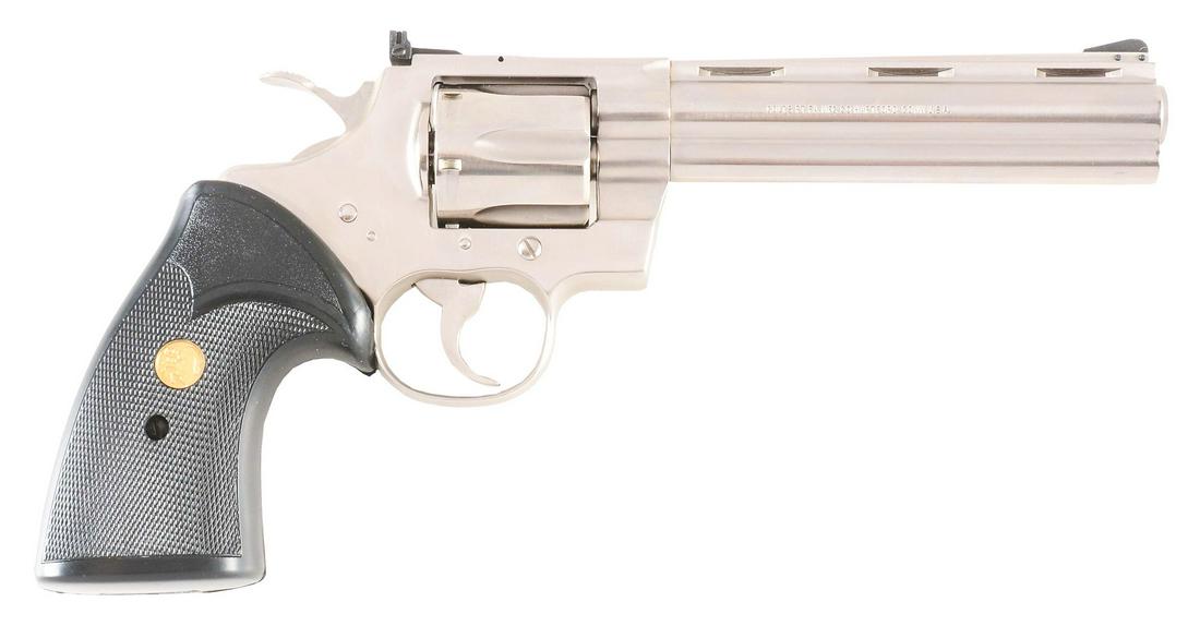 (M) COLT PYTHON DOUBLE ACTION REVOLVER WITH BOX (1980).: This is an example of a Python that left the factory as a blue gun and was ultimately stripped and refinished in a brushed nickel. This thinned out the pony and resulted in some slightly dished screws