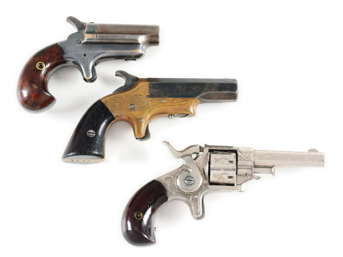 (A) LOT OF THREE: THREE ANTIQUE POCKET FIREARMS FROM: Lot consists of (A) Colt Number 3 Derringer in .41 rimfire with spur trigger and birds head grips. Barrel cut to 1 - 3/4" and front sight reset. CONDITION: Soft patina. (B) Southern Deringer in .41 ri