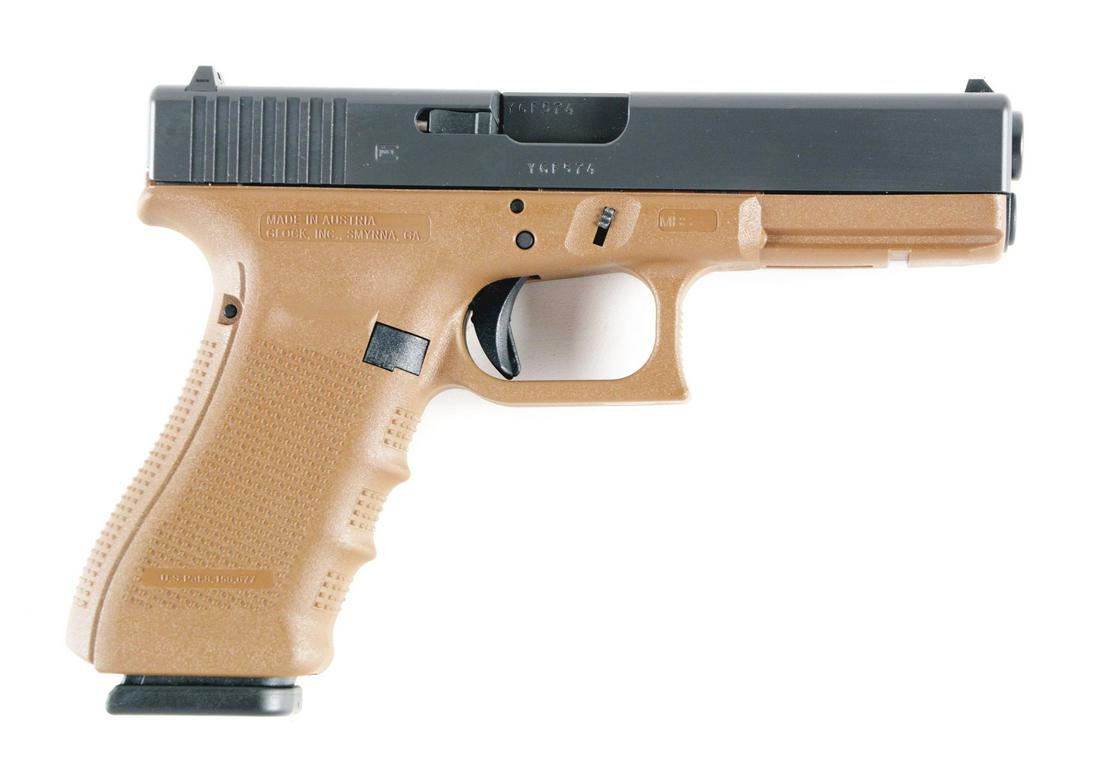 (M) GLOCK MODEL 22, GEN. 4, SEMI-AUTOMATIC .40 PISTOL: Glock Model 22 Gen 4 Semi Automatic Pistol With Case. Features the brown nylon frame and matte blue slide with white outline sights. CONDITION: Near new in case with minor storage marks. Accessories: 