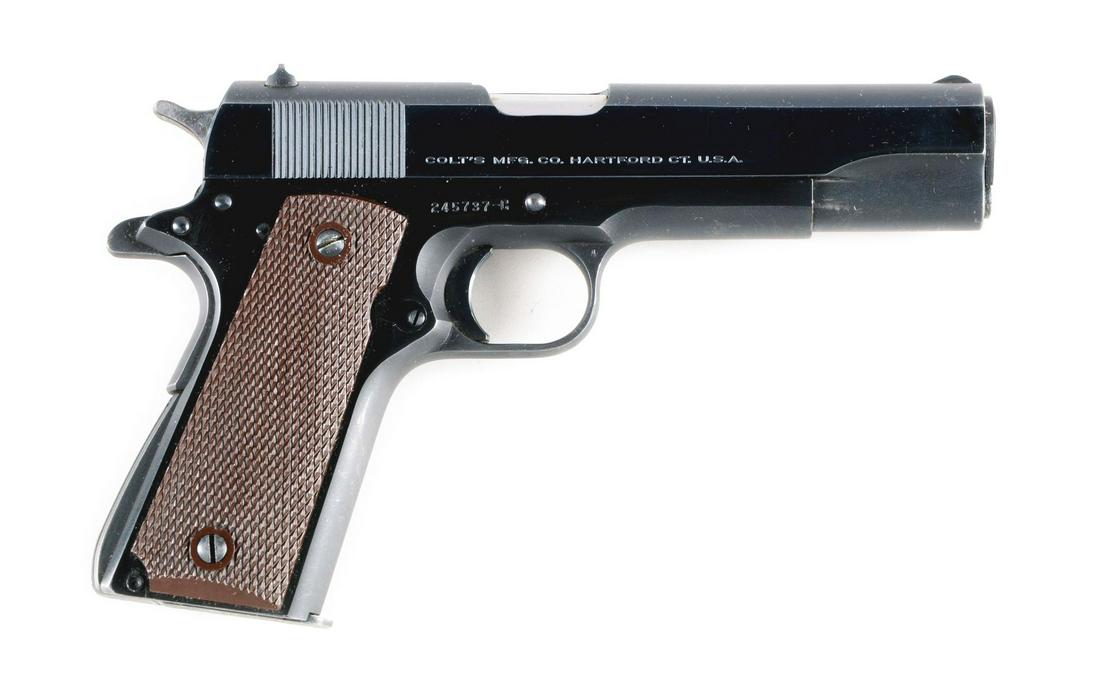 (C) BOXED COLT MODEL 1911-A1 SEMI-AUTOMATIC PISTOL: Offered is an early post-War Colt Model 1911-A1 pistol that was made in 1950 and comes in its original box, numbered to gun, with proper gold end label. This is a standard factory blue model with the 