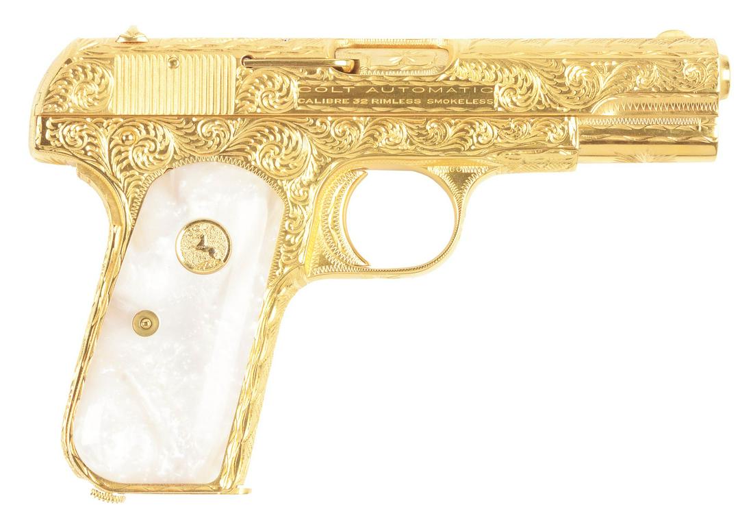 (C) JEFF FLANNERY ENGRAVED COLT 1903 SEMI AUTOMATIC: Elegantly engraved and embellished by Jeff Flannery of Union, Kentucky. This Colt Model 1903 Pocket Hammerless .32 pistol is scroll and vine engraved and richly gold plated. Fitted with a brilliant pa