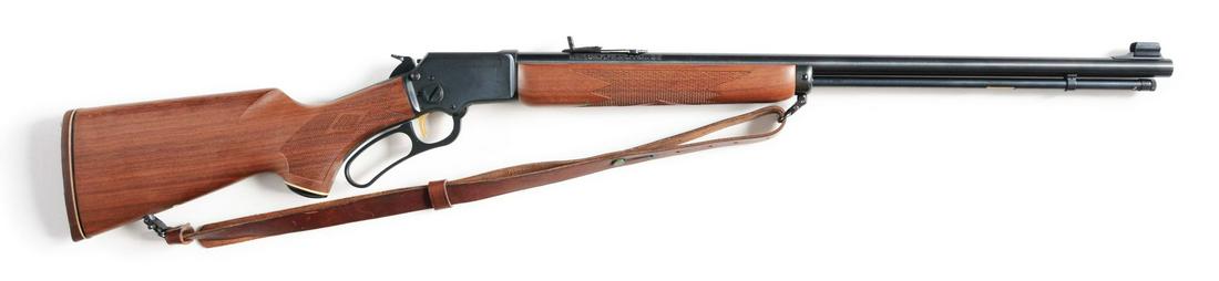 (M) MARLIN GOLDEN 39AS .22 SL&LR LEVER ACTION RIFLE.: Made in 1993. Checkered wrist and forend. Round barrel. Push button safety on receiver. JM marked on the left side of the barrel. Equipped with a brown leather sling. CONDITION: Retains 98% original f