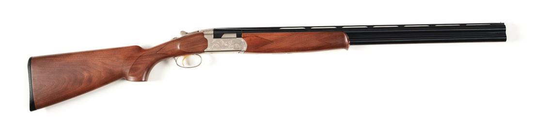(M) CASED BERETTA ULTRALIGHT OVER-UNDER SHOTGUN.: As new Beretta Ultralite over-under with single selective trigger and ejectors. Beretta Multichoke (three tubes with wrench) barrel with ventilated rib and brass bead front sight, checkered pistol gri
