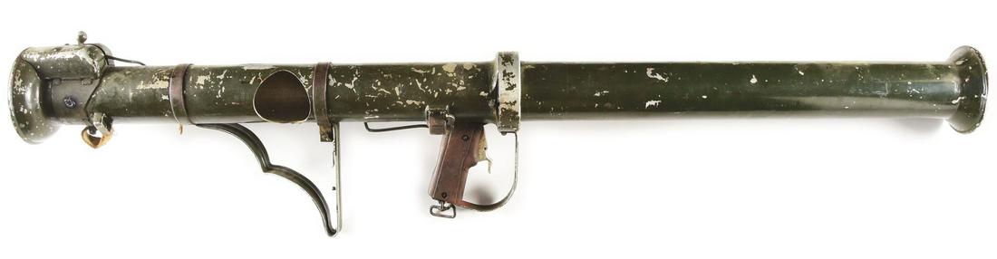 DEMILLED BRITISH MADE M20 3.5 INCH SUPER BAZOOKA ROCKET: This is a British made copy of the American M20 "Super Bazooka". Took a 3.5" rocket. Made of aluminum. These were made during the Korean War era. The British made ones feature wood grips. Takes down i