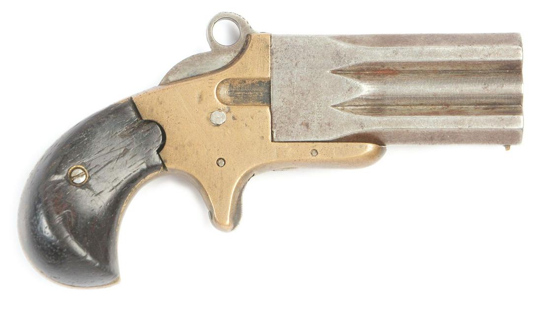 (A) FRANK WESSON STACKED THREE BARREL DERRINGER.: Made from 1868-1880 and referred to as the "Watch Fob" Derringer. Caliber is .22 short with 2" barrels and brass frame. Total made 3500. This is an early first type. Birds head grips are rosewood. The