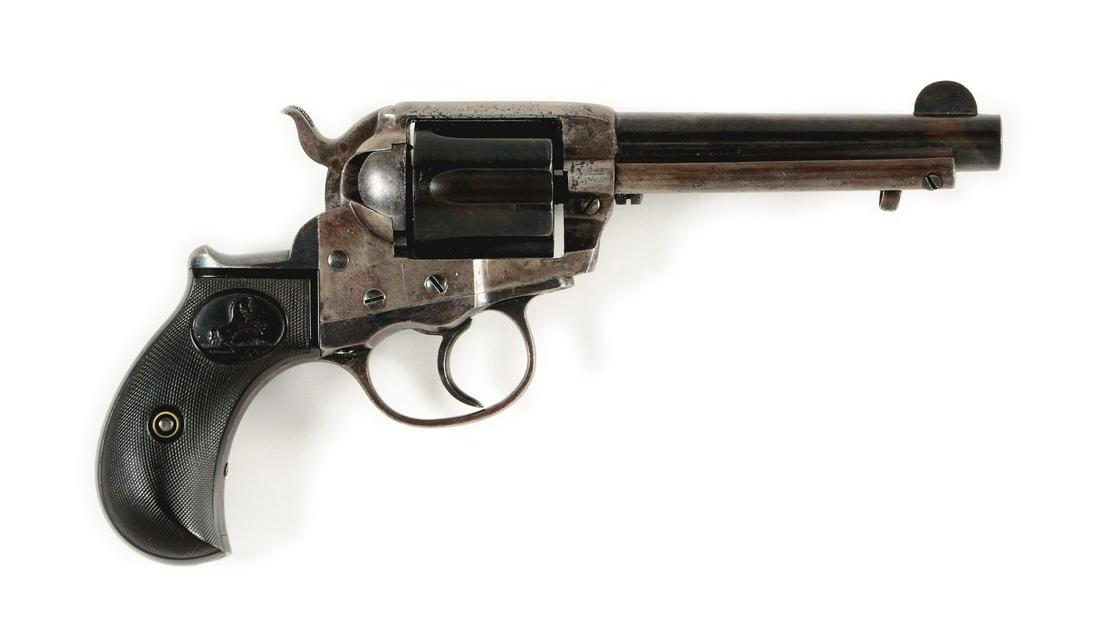 (C) COLT MODEL 1877 LIGHTNING DOUBLE ACTION REVOLVER: The Colt Model 1877 Lightning was the first factory offered double action revolver. It was widely popular from coast to coast due to its "lightning fast" double action operation and handy size. Featur