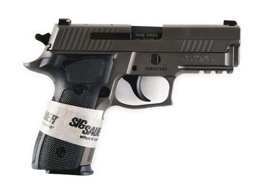 (M) SIG SAUER P229 LEGION 9MM SEMI-AUTOMATIC PISTOL.: SIG Sauer P229 Legion compact semi-automatic pistol. Features a black/gray stainless steel slide, three 15 round magazines, single/double action trigger, SIG rail, and alloy frame. Includes factory pl