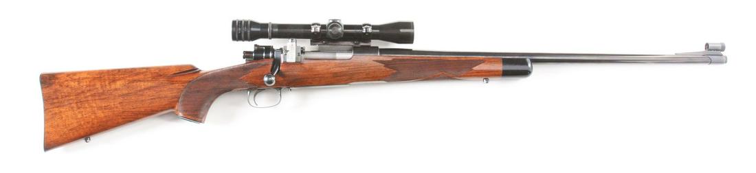(C) BEAUTIFUL WALLACK & HOLMES CUSTOM MAUSER SPORTING: This sporting rifle was built in the classic Griffin & Howe style using a Mauser action and barreled to the .257 Weatherby cartridge. It features the wrap around front sight with no provision for a re
