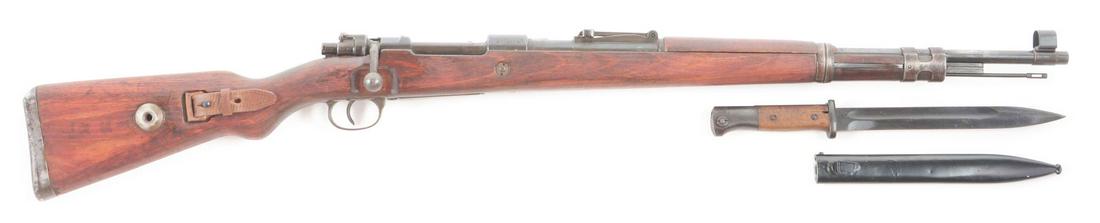 (C) WWII NAZI GERMAN MAUSER BYF 41 98K WITH BAYONET.: Standard configuration 98k Mauser rifle. Marked on the receiver ring "byf/ 41". Bolt is not matching, the rest of the numbers appear to be. Not import marked. Reproduction leather sling and front sigh