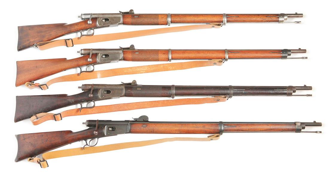 (C) LOT OF 4: SWISS VETTERLI BOLT ACTION MILITARY: Lot consists of four Swiss made bolt action tube magazine rifles. (A) Full military stock Model 1869 with checkered hand grip. Made by V. Sauerbrey in Basel. Military sights with leather reproduction 