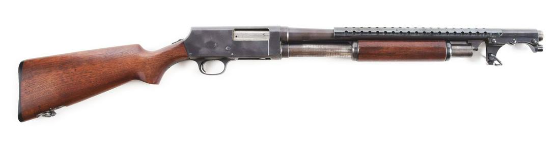 (C) STEVENS MODEL 520-30 SLIDE ACTION TRENCH GUN.: World War II production Stevens 520 trench gun / riot gun. 12 gauge 5 shot takedown pump shotgun with ventilated heat shield and lugged to accept Model 1917 Pattern Bayonet. Sling swivels fitted in bu