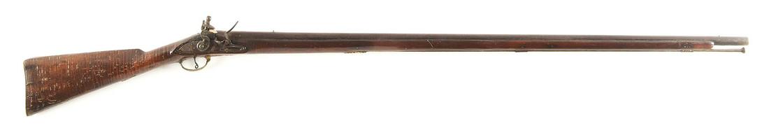 (A) AMERICAN TIGER MAPLE STOCKED FLINTLOCK MUSKET.: Probably circa 1790, this musket features a round barrel with small sights added during the period of use and a bayonet lug mounted on the bottom, which has been filed down. The breech is stamped with