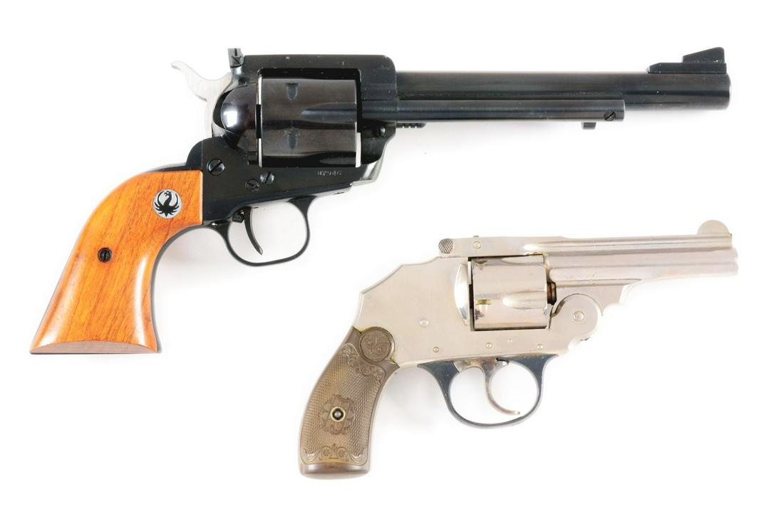 (C) LOT OF TWO: BOXED RUGER FLAT-TOP .357 REVOLVER: Lot consists of: (A) Ruger flat-top with its original box; box is in nearly destroyed condition. Gun was returned to factory and had the new box used when repaired and shipped back. The returned parts