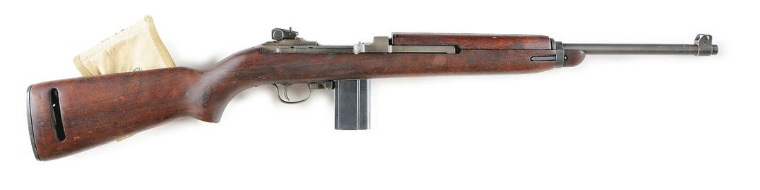 (C)UNDERWOOD M1 CARBINE SEMI AUTOMATIC RIFLE.: 3-44 dated Underwood dated barrel, push button safety and unmarked mag release. Walnut stocks "U" marked in sling channel and 2 rivet unmarked handguard. Slide adjustable rear sight, and comes with 3 