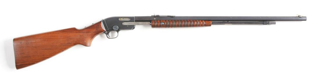 (C) SAVAGE MODEL 25 PUMP ACTION .22 SL&LR RIFLE.: These guns were made 1925-1929. Octagon barrel. Push button safety on trigger guard. Tube fed under barrel. Receiver tang is drilled and tapped for a sight, mounting screws still present, slight inden