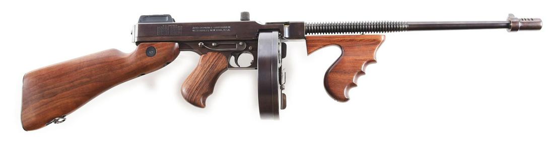 (M) AUTO ORDNANCE 1927A1 SEMI AUTOMATIC RIFLE.: Auto Ordnance Corporation semi-automatic model 1927A-1 carbine. .45 ACP with 50 round drum magazine and walnut furniture. CONDITION: Very good as refinished. Barrel, receiver, and trigger housing reta