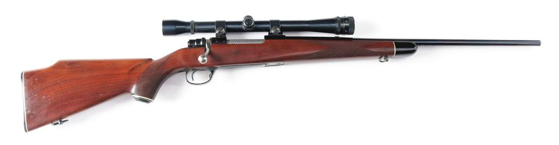 (C) HUSQVARNA VAPENFABRIKS BOLT ACTION RIFLE (1922).: Husqvarna Model 3000 Mauser style bolt action built in Sweden from 1954-1972. Walnut checkered pistol gripped Monte Carlo stock with black forend tip and pistol grip cap. Blued barrel and receiver wit