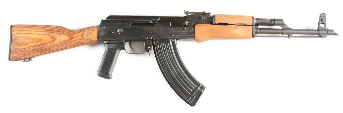 (M) ROMANIAN WASR-10 SEMI-AUTOMATIC AK PATTERN RIFLE.: Standard semi-automatic AK-47 design with wooden furniture. Stamped receiver. Polymer grip. Stamped left side for manufacture by Romarm SA/Cugir and imported by Century Arms. Comes with cardboard box 