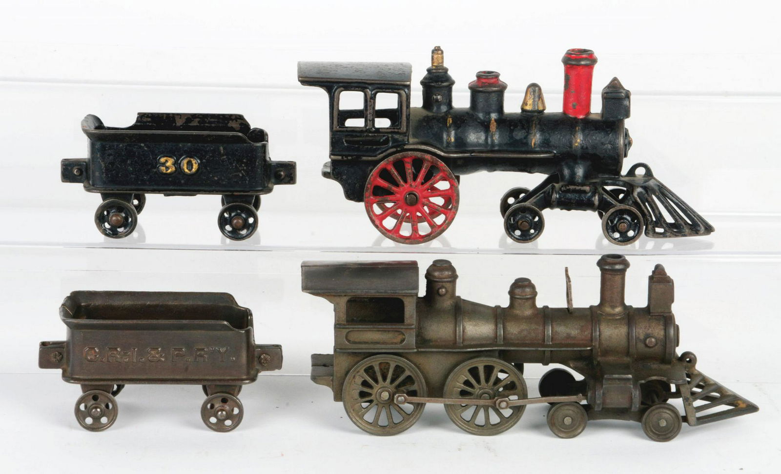 Lot of 4: Cast-Iron Toy Floor Trains. (1 of 1)