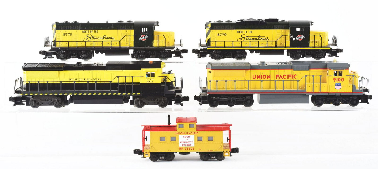 Lot of 5: Lionel Diesel Locomotives & Caboose.: Lot consists of: Lionel No. 4002 Susquehanna Diesel Locomotive - powered. Lionel No. 8779 GP20 Dummy Locomotive. No. 8776 Lionel Powered Unit. No. 9100 Union Pacific Diesel Locomotive and No. 25506 Un