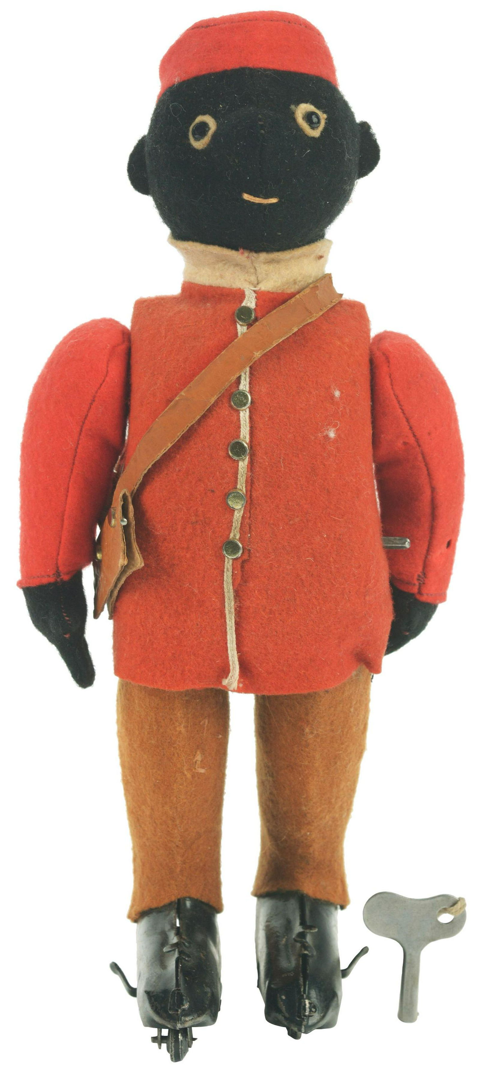 Mechanical Key-Wind Black American Bell Hop.: All original including original clothes. Feet walk when wound. Condition: (Excellent). Dimensions: 10 - 1/2" x 5" x 3 - 1/2".