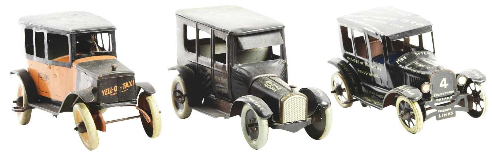 Lot of 3: American Made Tin-Litho Wind-Up Vehicle Toys.: Lot consists of: first, a Strauss Yell-O-Taxy Taxi Toy with original driver; second, a Strauss Leaping Lena with original driver; and third, a Marx Old Jalopy Car with original driver. Various conditi