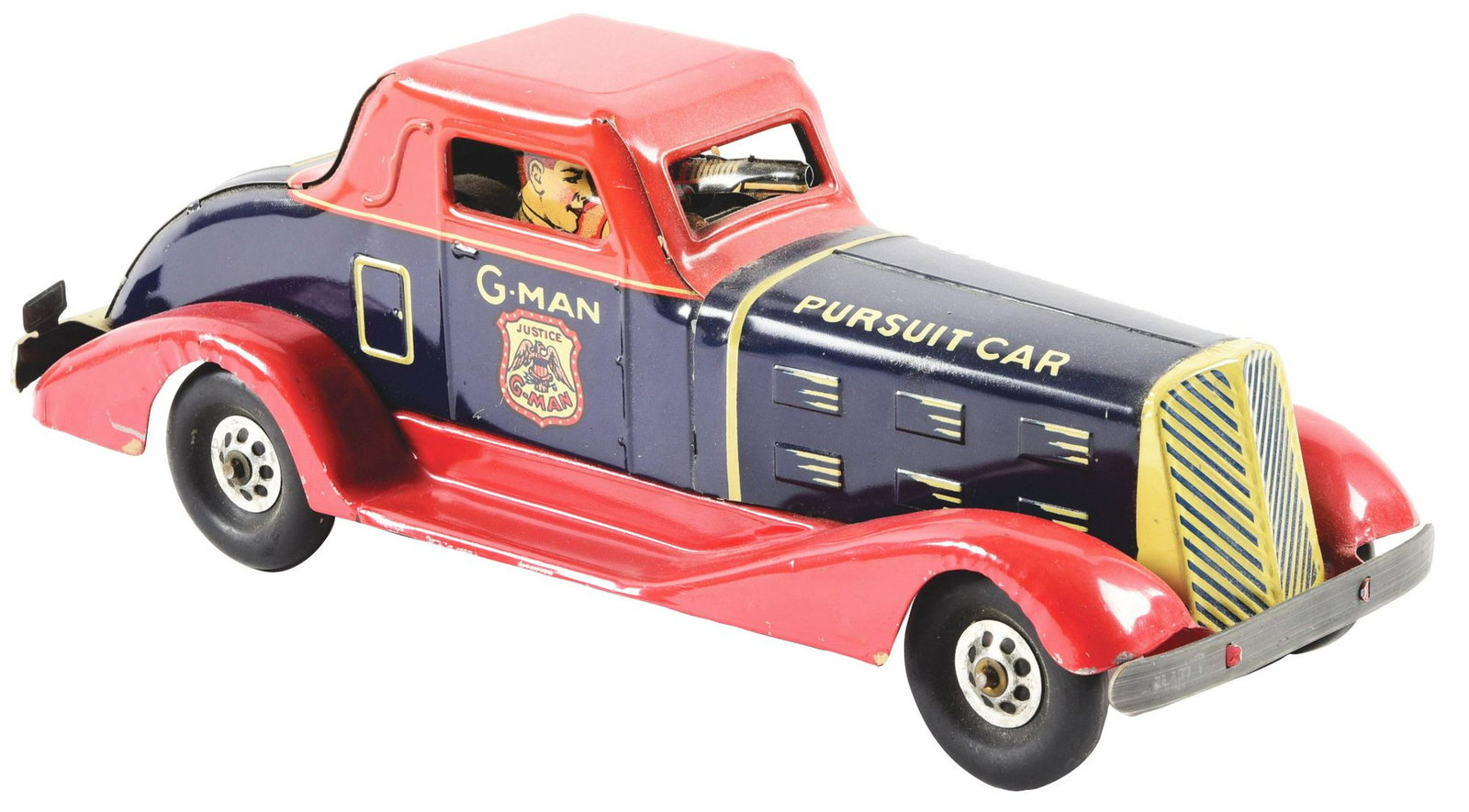Pressed Steel Marx G-Man Wind-Up Pursuit Car.: Original figure holding Tommy Gun in window. Complete including license plate and rear tail light. Some scratching and wear to fenders, but overall excellent condition. Condition: (Excellent). Dimensi