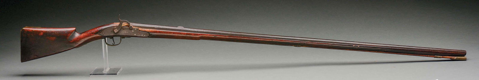 (A) Extremely Rare and Early American Trade Fowler With: Three-stage smoothbore barrel marked on left side of breech with three British proofmarks, one for John Williams who worked between 1700 and 1731. Large banana lockplate with partially visible "Cookso