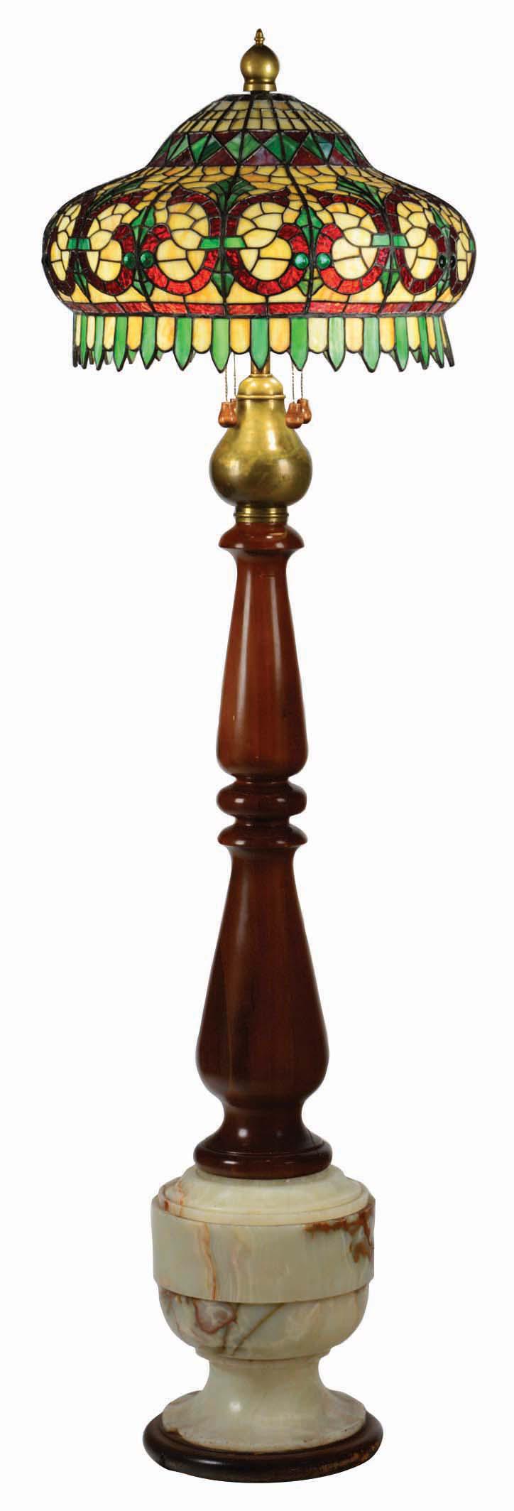 SODA SHOP STYLE LEADED GLASS LAMP.: Circa 1920s. Soda shop style leaded glass lamp with agate base has beautiful beautiful styled leaded glass shade with ornate agate and wood base. Condition (Excellent). Dimensions 71 - 1/4" x 14" x 14