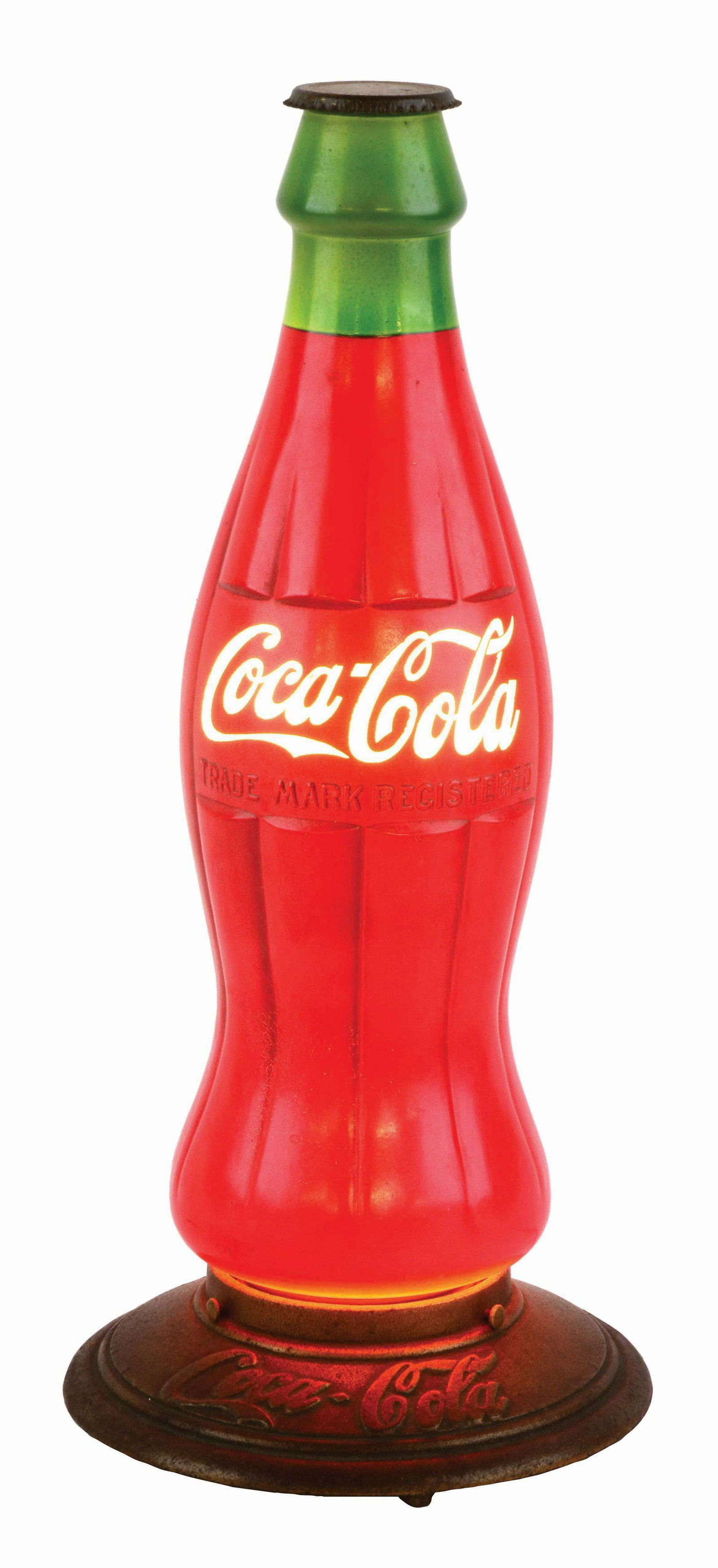 COCA-COLA GLASS BOTTLE LIGHT-UP ADVERTISING SIGN.: This sign retains its original base as well as tin bottle cap. There is one missing bolt on the bottom of the base. There is some light cloudiness to the bottle but overall this place displays well ab