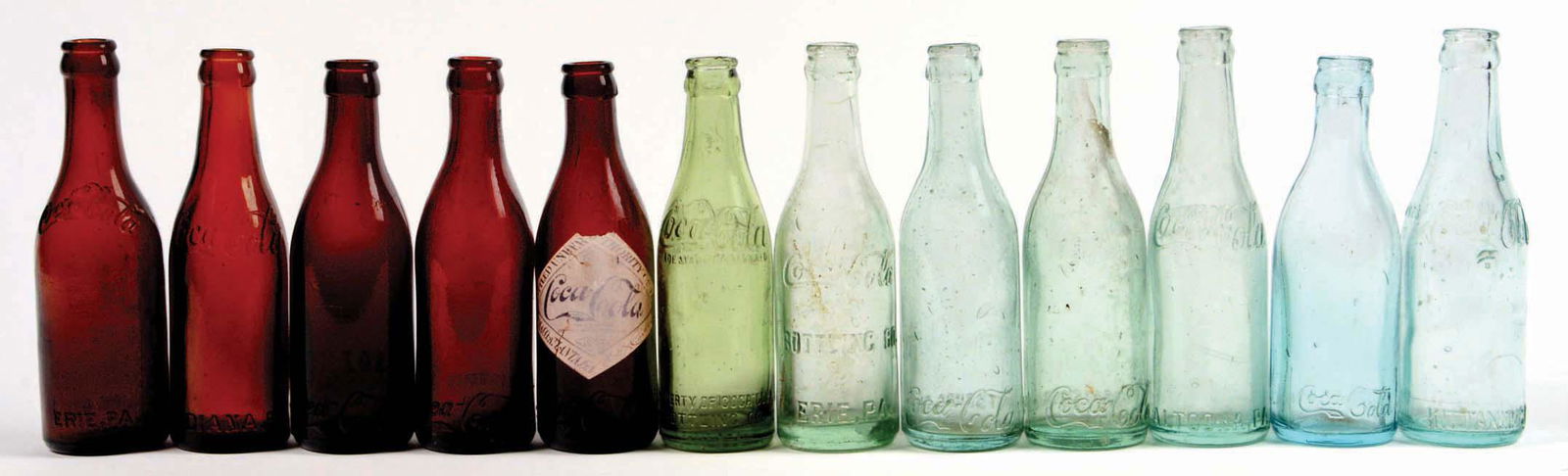 LOT OF 12: AMBER & AQUA PENNSYLVANIA COCA-COLA BOTTLES. (1 of 1)