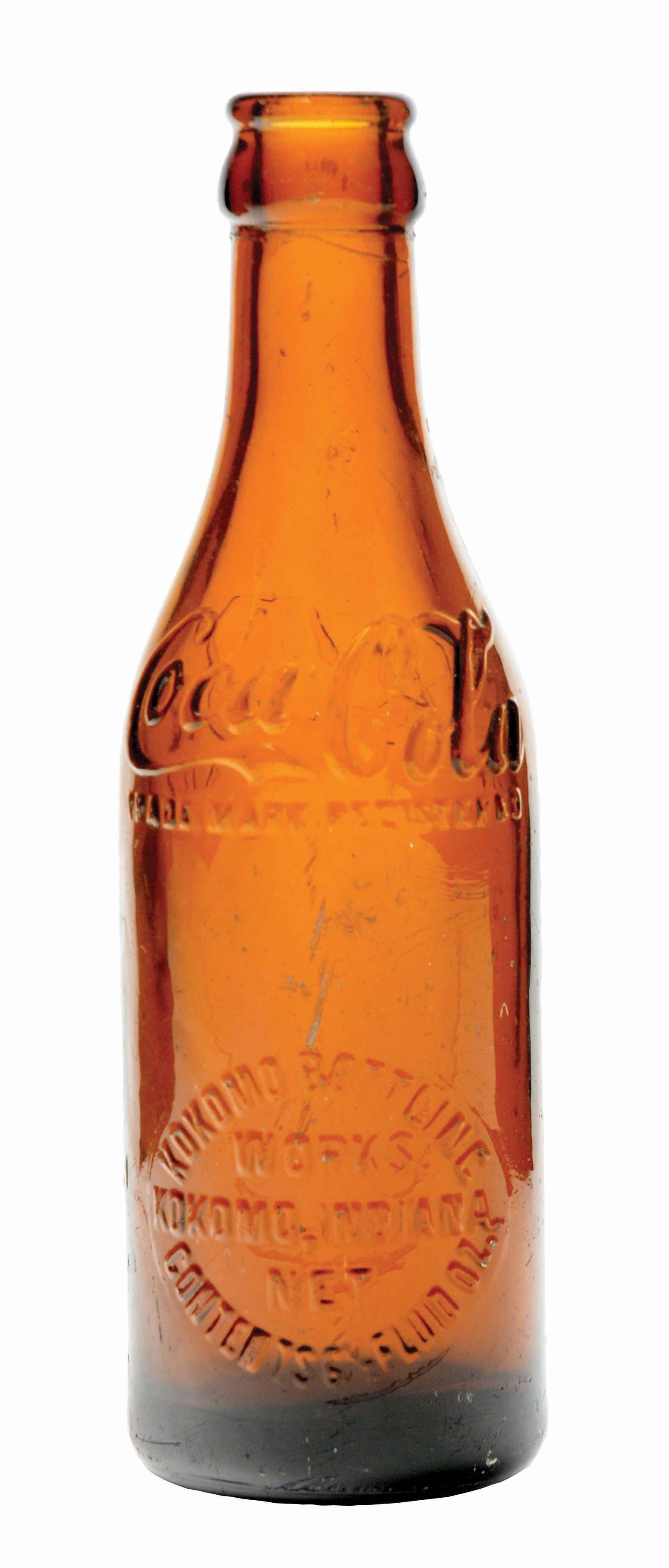 KOKOMO, INDIANA AMBER COCA-COLA BOTTLE.: Excellent condition. Condition (Excellent). Dimensions 7 - 1/2" x 2 - 1/4".