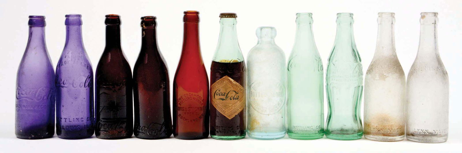 LOT OF 11: MISCELLANEOUS COCA-COLA BOTTLES. (1 of 1)