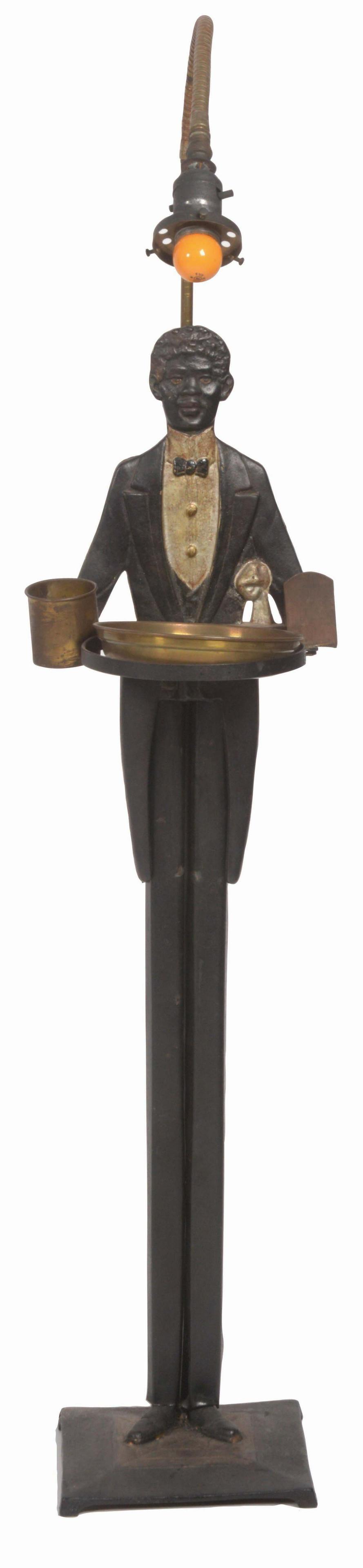 CAST-IRON BUTLER SMOKING STAND WITH ORIGINAL LAMP. (1 of 4)