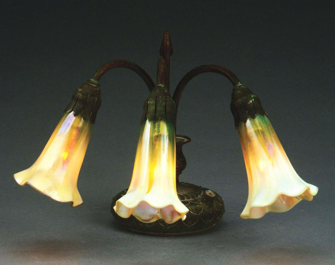 TIFFANY STUDIOS THREE-LIGHT LILY LAMP. (1 of 10)