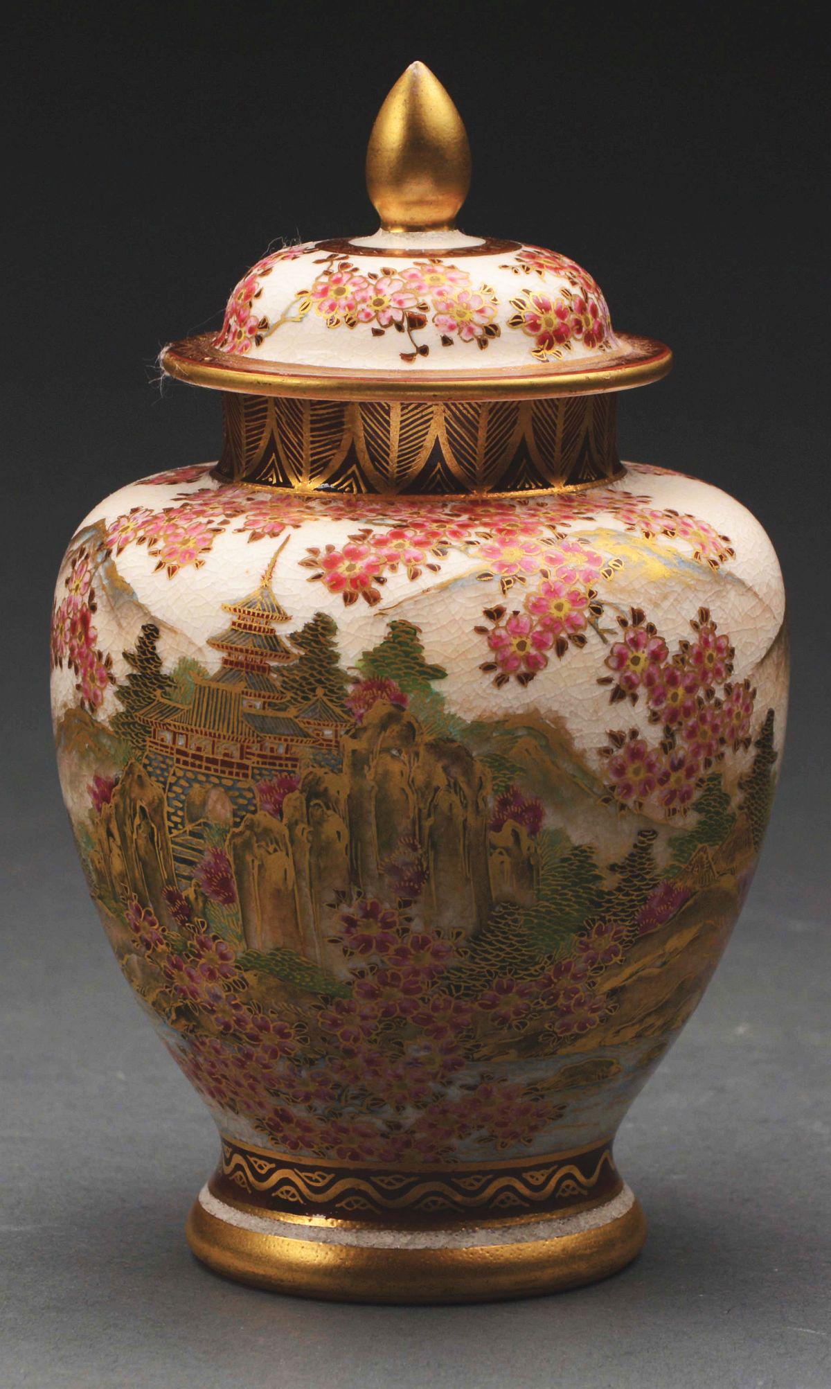 A SMALL SATSUMA COVERED JAR. (1 of 4)