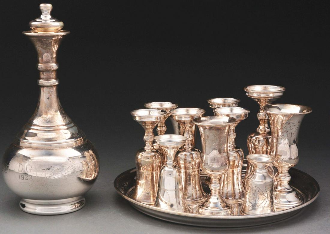 STERLING SILVER DECANTER SET. (1 of 2)