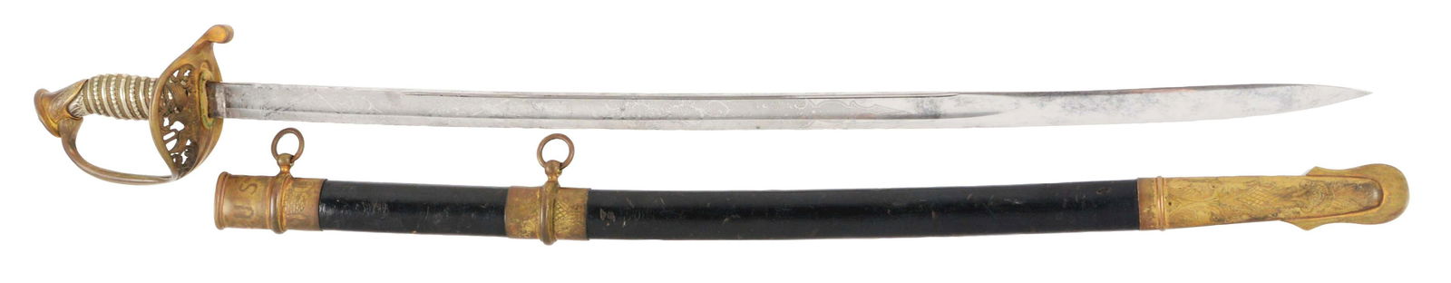 U.S. MODEL 1850 STAFF AND FIELD OFFICER'S PRESENTATION: Civil War 1850 staff and field officer's sword by Emerson and Silver of New Jersey. Regulation pattern with some non-regulation touches. Pommel and guard with floral motifs, but central motif of the c