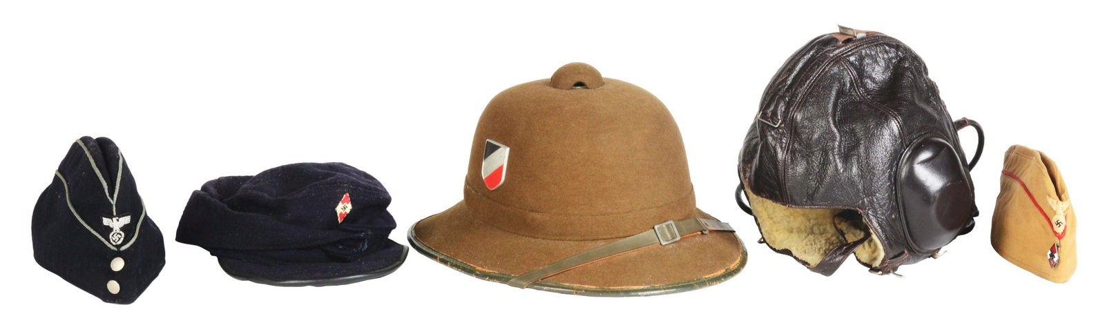 LOT OF FIVE: THIRD REICH FLIGHT HELMET, PITH HELMET,: Lot contains: (A) Luftwaffe leather flight helmet, (B) Heer pith helmet, (C) Hitler Youth overseas cap, (D) Hitler Youth M43 cap, and (E) Third Reich DAF cap. (A) Luftwaffe brown leather fur lined fli