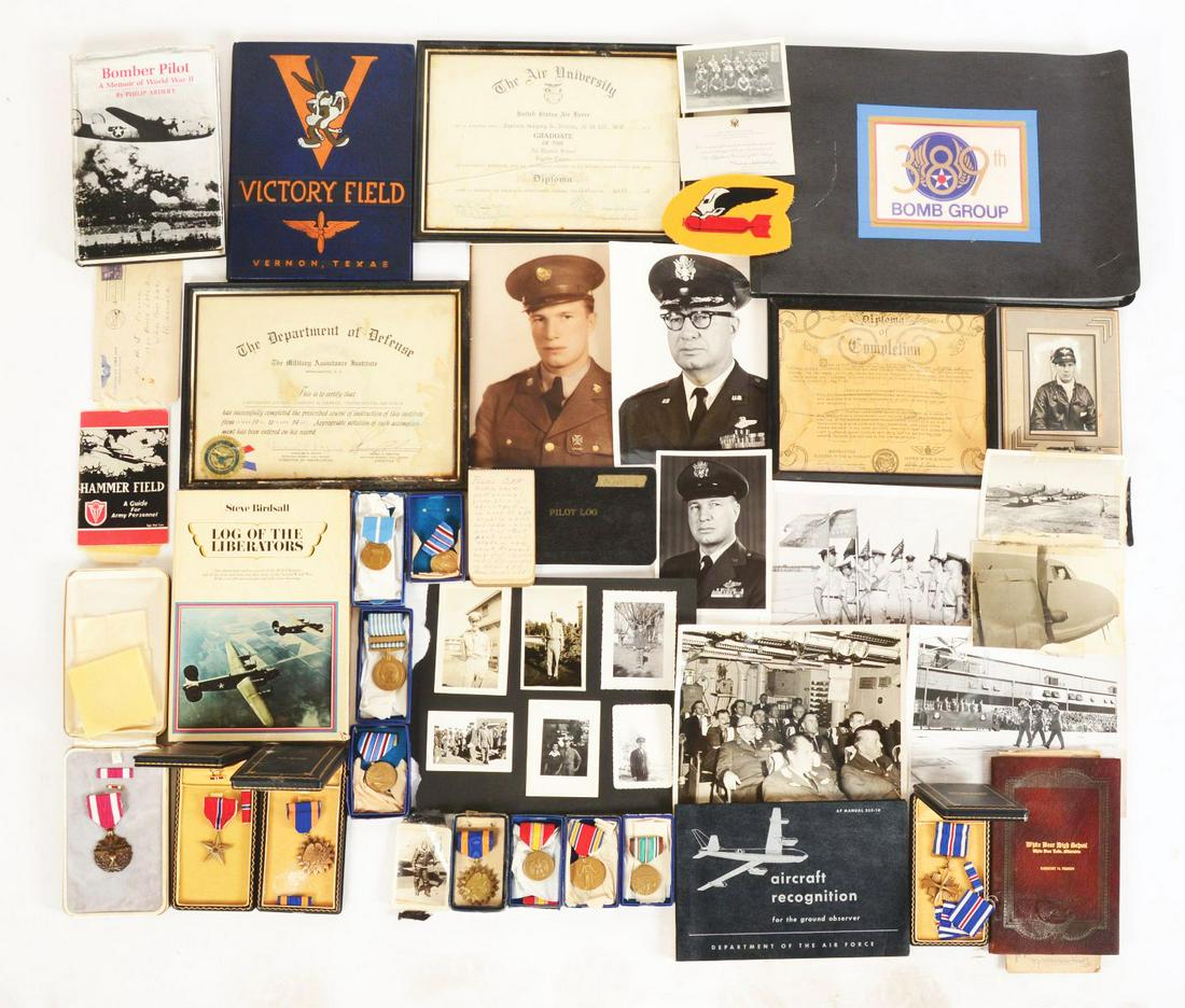LARGE LOT OF WORLD WAR II MEDALS AND EPHEMERA RELATING: Group identified to Captain Gregory H. Perron who served as a pilot in the 9th Air Force during World War II. The group consists of the following cased medals: Distinguished Flying Cross named on the