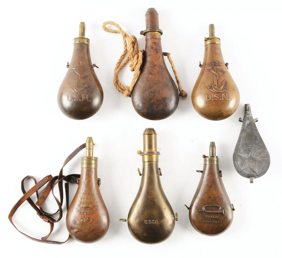 LOT OF 7: US POWDER FLASKS - LIFE SAVING, USN, PUBLIC: Lot consist of: Seven flasks; six service flasks of copper and brass, and one of tinned iron with impressed star and cap tin compartment. (A) USN fouled anchor 1846 dated on top with "Adams / J.S.P." 