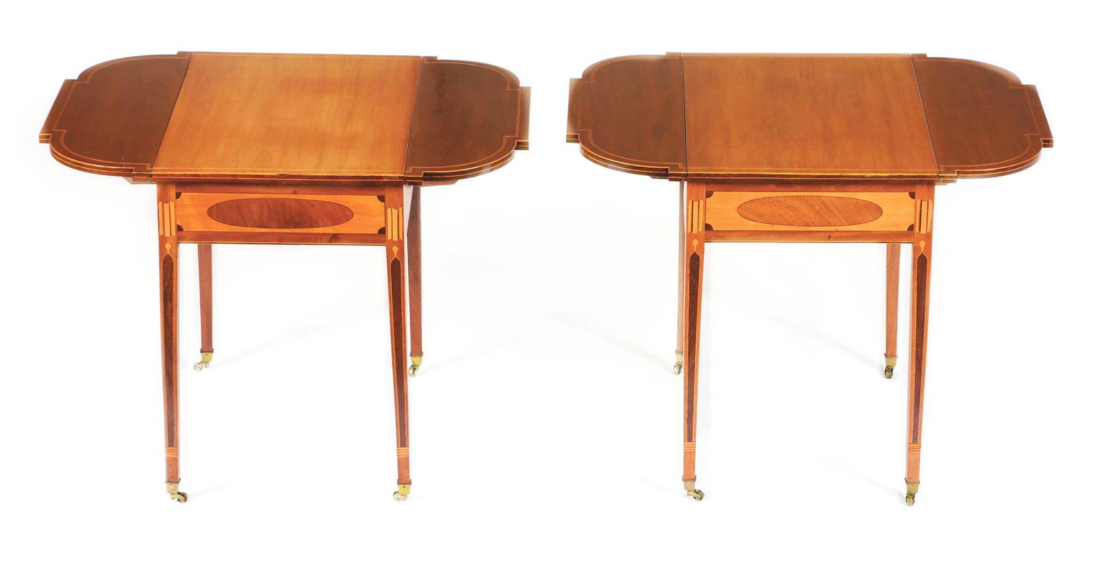 RARE PAIR OF HEPPLEWHITE PEMBROKE TABLES. PROBABLY: The tables have rectangular tops and ovolo shaped leaves with inlaid stringing on the edges framing the shape of the top. Conforming base with elaborately inlaid skirts with rectangular stringing cent