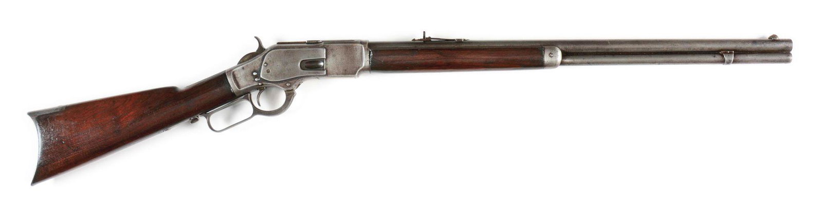 (A) WINCHESTER MODEL 1873 LEVER ACTION RIFLE.: 1881 vintage Model 1873. Full round barrel. Full length magazine tube. Plain straight grain walnut stock and forearm. Rifle style crescent buttplate. CONDITION: Very good with a cleaned gunmetal grey 