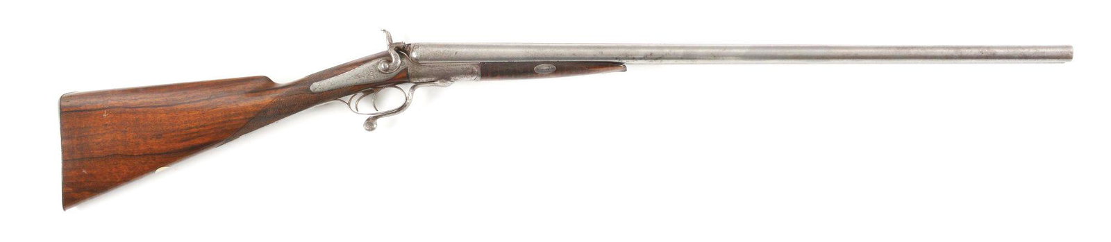 (A) JD DOUGALL SIDE BY SIDE SHOTGUN.: Underlever Damascus shotgun made by J.D. Dougall, Glasgow. Scotland. Floral engraved back action locks with engraved hammers. Damascus barrel with concave smooth rib and single bead sight. Straight gr