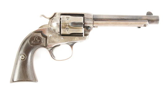 (C) COLT BISLEY MODEL SNGLE ACTION REVOLVER WITH: Colt Bisley Model Single Action Revolver with leather belt holster. Serial number dates this gun to 1907. Original finish and factory Colt grips. Serial numbers on the frame, trigger guard and grip