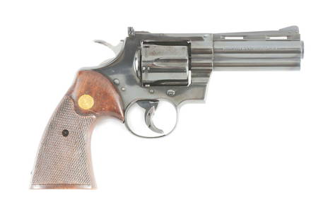 (C) COLT PYTHON .357 MAGNUM REVOLVER: Colt Python .357 Magnum manufactured 1960. 4" full lugged barrel with oversized Colt checkered walnut grips. Single and double action operation with Williams trigger shoe installed. CONDITION: Very